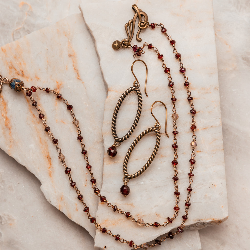 Religious Gift Idea - Michaela Garnet Beaded Necklace with antique brass embellishments. Holy medal medallion and 24" length make it a thoughtful Christian/Catholic gift