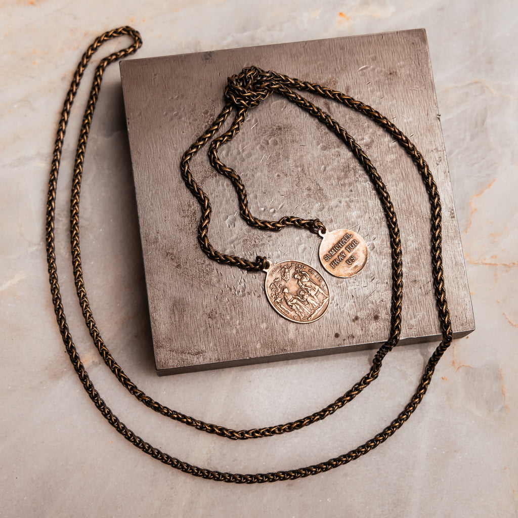 Sophie Necklace - Hand-cast bronze medals on a 40" long lariat necklace for stylish versatility