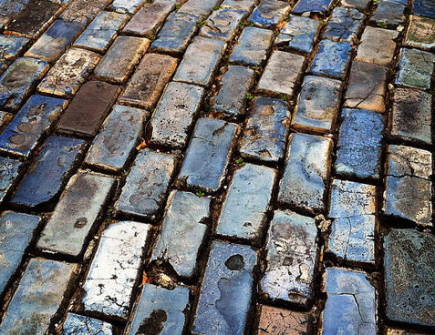 Encounters on these blue cobblestone streets