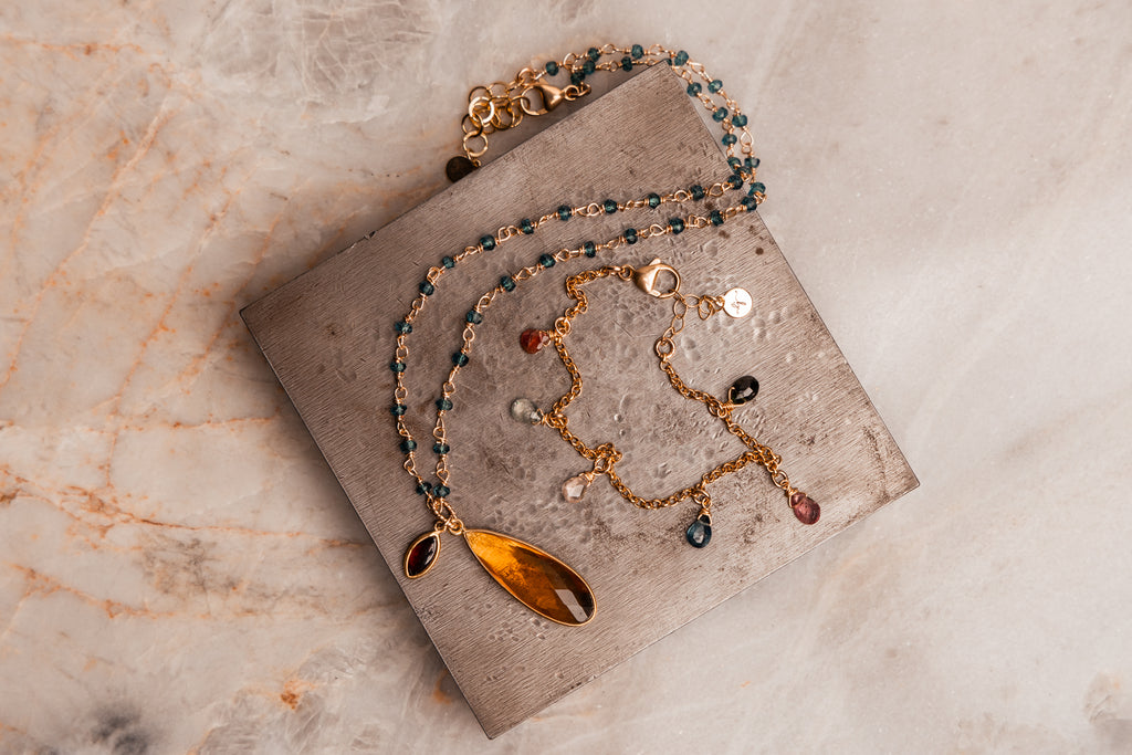 Adjustable 16-18 inch necklace with blue gemstone chain and golden citrine drop and matching gemstone bracelet