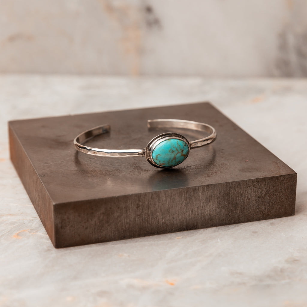 Turquoise Beauty - Elevate your style with our Handcrafted Turquoise Sterling Silver Cuff Bracelet. Hand-hammered and hand-forged, it's a wearable work of art. #TranquilJewelry #ArtisanCuff