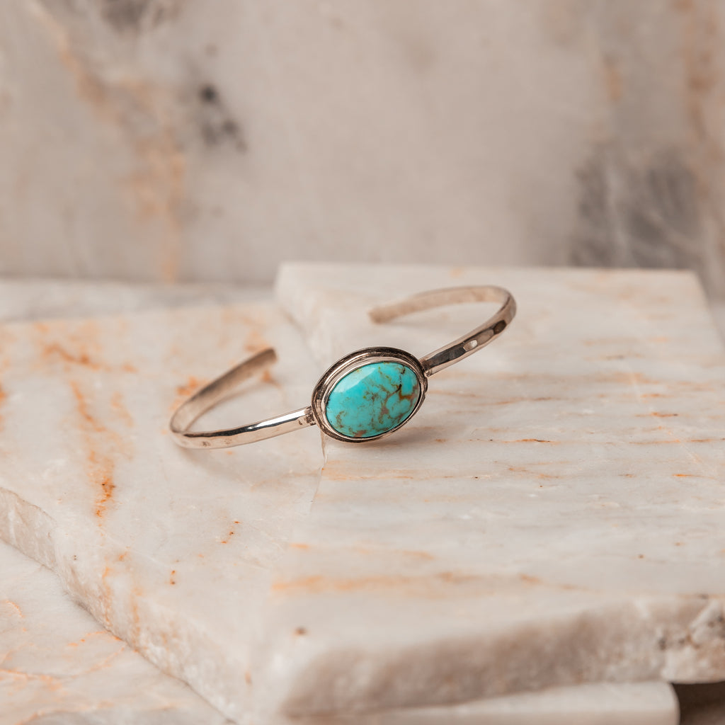 Genuine Turquoise Elegance - Embrace the timeless charm of our Handcrafted Sterling Silver Cuff Bracelet. Adjustable and beautifully handcrafted for a personalized touch. #TurquoiseAccessories #HandmadeElegance