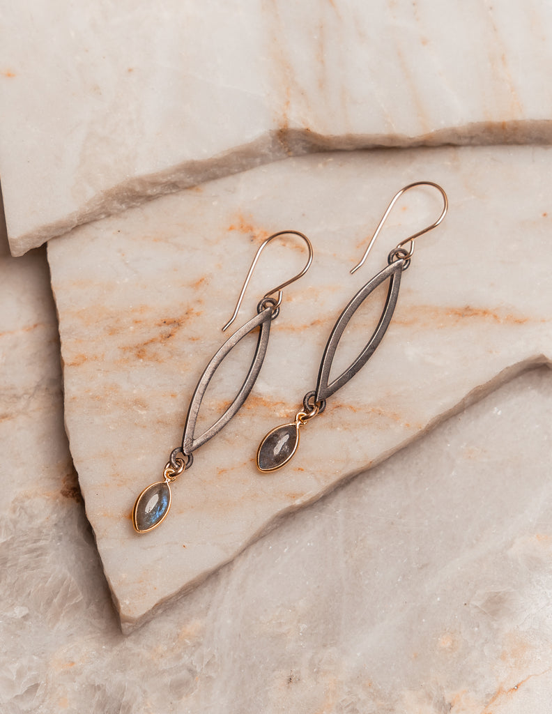 Mixed metal statement earrings with a moody labradorite drop—designed for modern, artistic style.