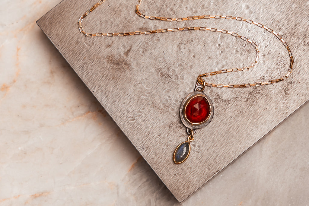 Meaningful jewelry gift for her – artisan garnet and labradorite necklace with designer details.