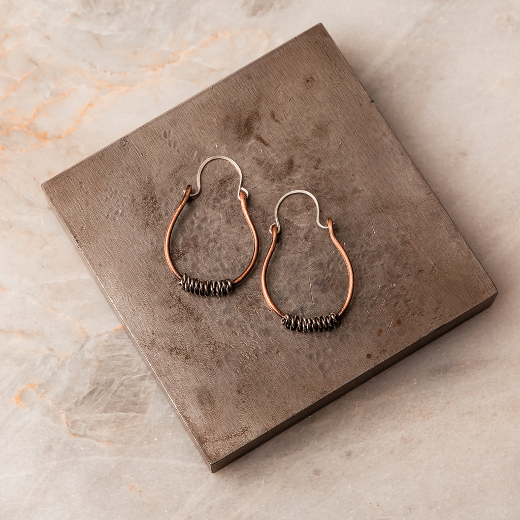 Handcrafted Mixed Metal Design with Oxidized Copper and Sterling Silver. Artisanal Craftsmanship, Rustic Style, Bohemian Flair.