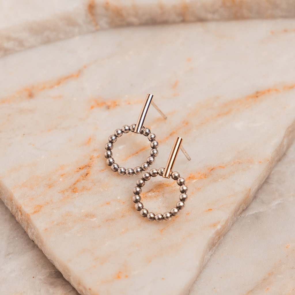 Lightweight artisan earrings with a modern mixed metal design, perfect for everyday wear and meaningful gifting