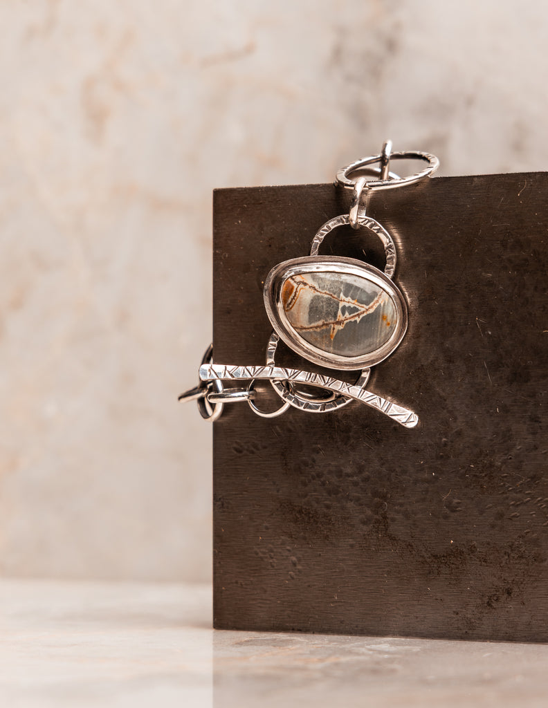 Statement gemstone bracelet – dendritic rhyolite jasper set in hand hammered silver.