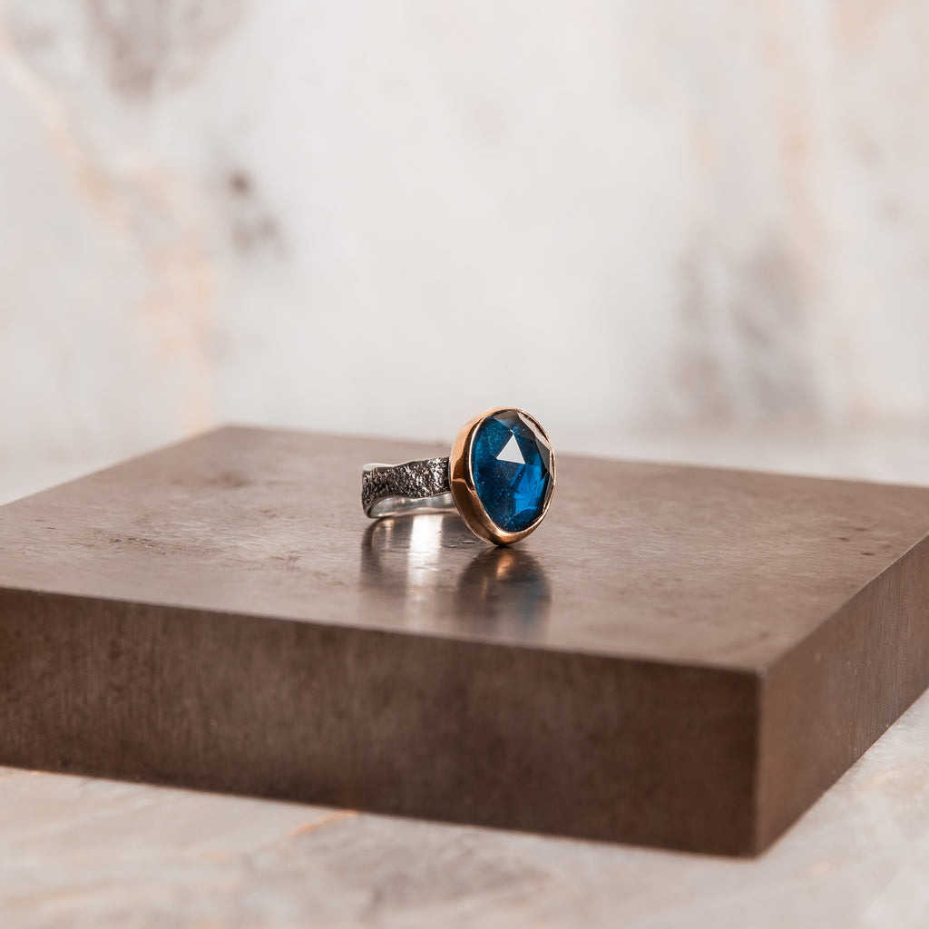 gold and silver gemstone ring
