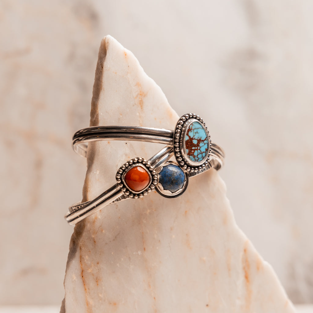 Stackable artisan cuff bracelet featuring natural turquoise, mexican opal, lapis lazuli