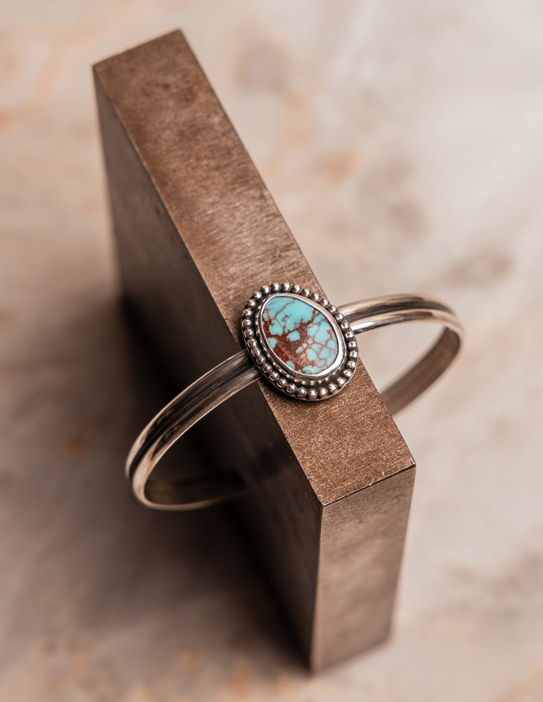 Unique sterling silver and turquoise bracelet with artisanal finish