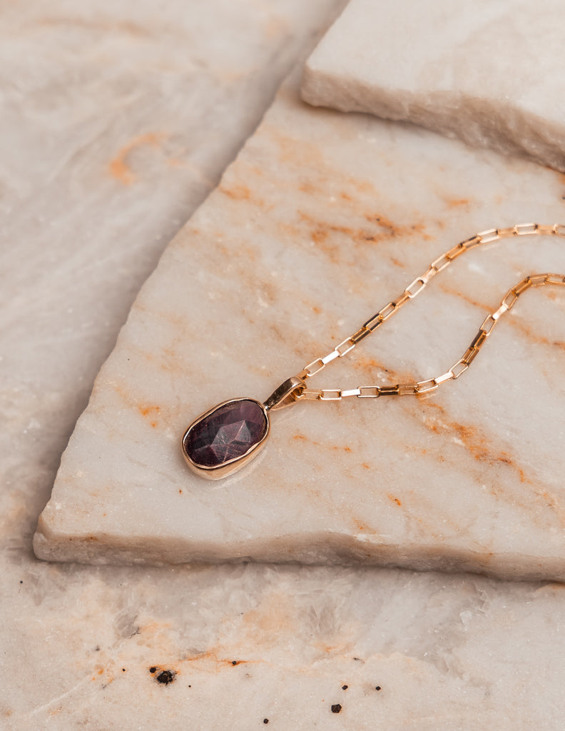 Timeless artisan necklace featuring a rose-cut ruby and gold vermeil chain—perfect for layering or solo wear.