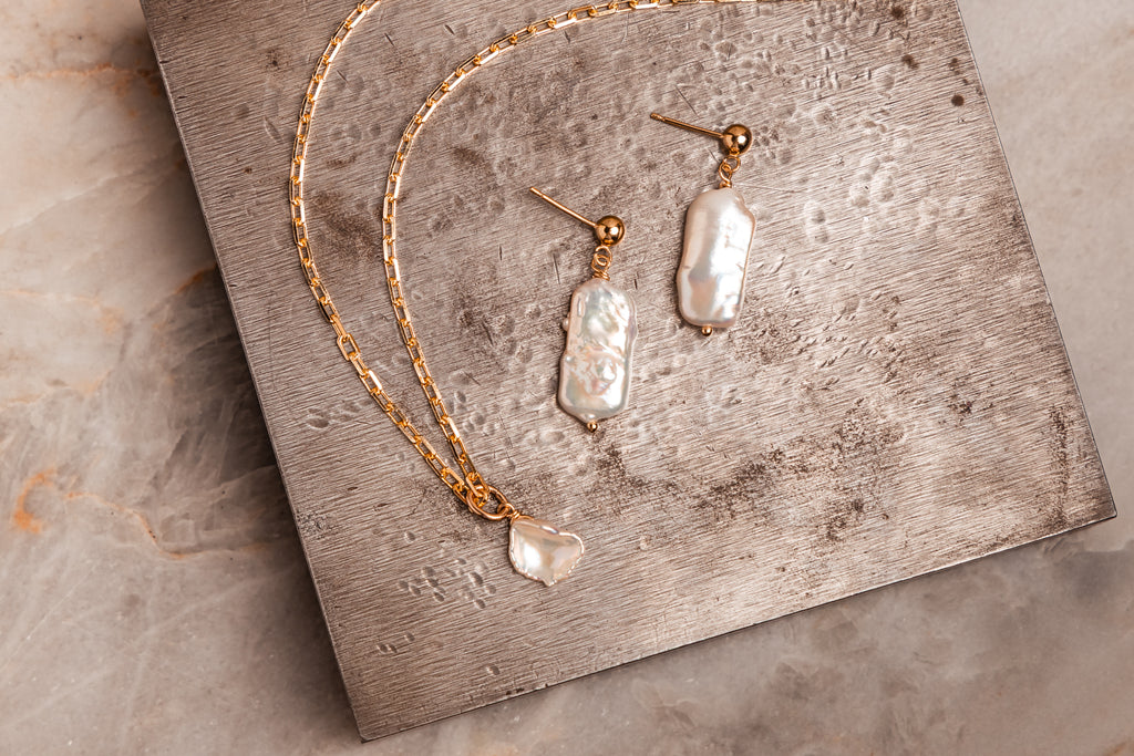 Modern pearl drop earrings – luminous keshi pearls on gold filled settings.