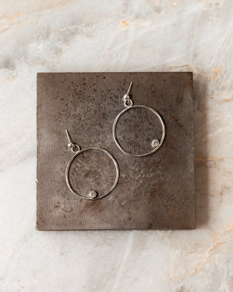 pretty silver hoop earrings with gems