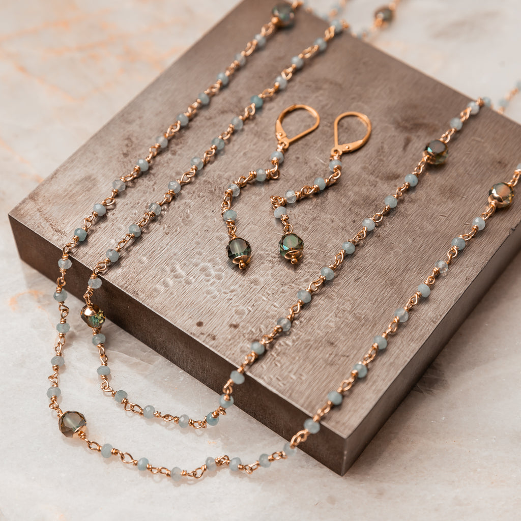 Handcrafted Beauty - Cosette Beaded Necklace with aquamarine gemstones and sage green touches, elegantly wire-wrapped by hand. Versatile layering