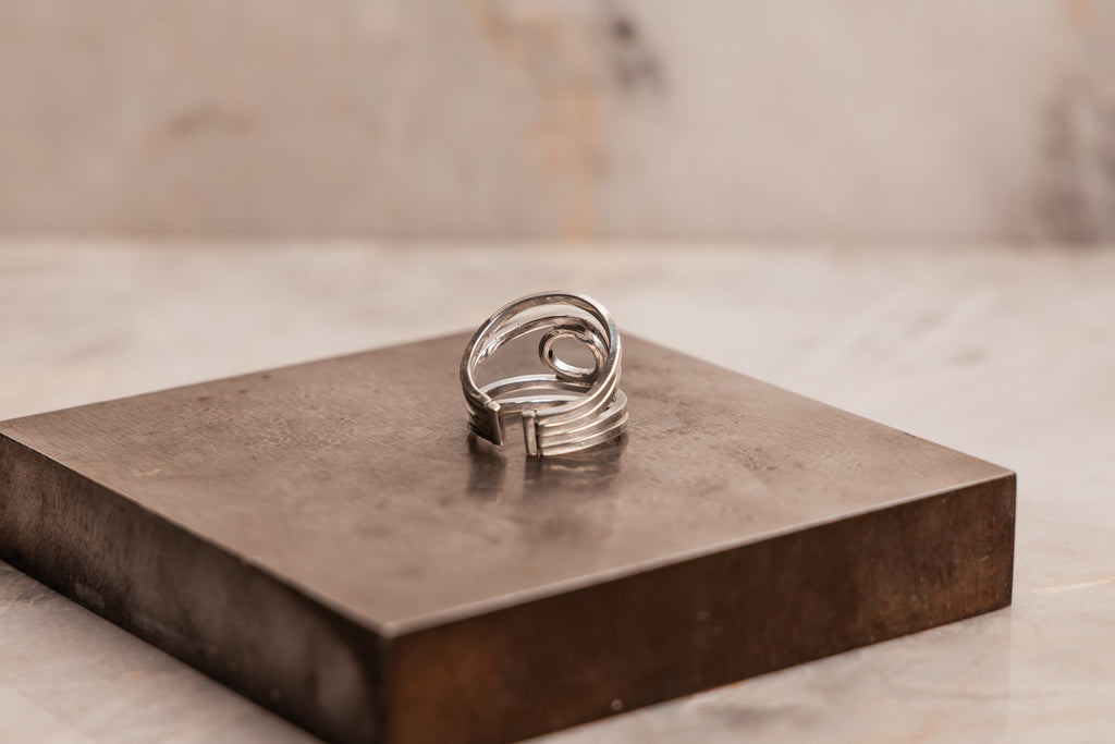 Artisan-made adjustable ring in sterling silver, perfect for gifting or building a timeless jewelry collection
