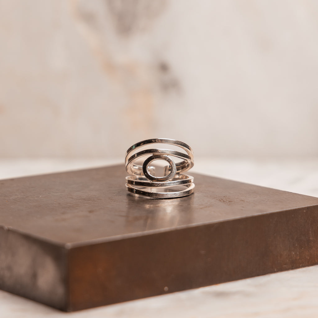 Handcrafted sterling silver statement ring with modern open design, perfect for minimalist luxury style