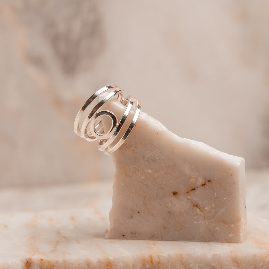 Minimalist sterling silver ring with bold architecture and comfortable fit, handcrafted for modern style lovers