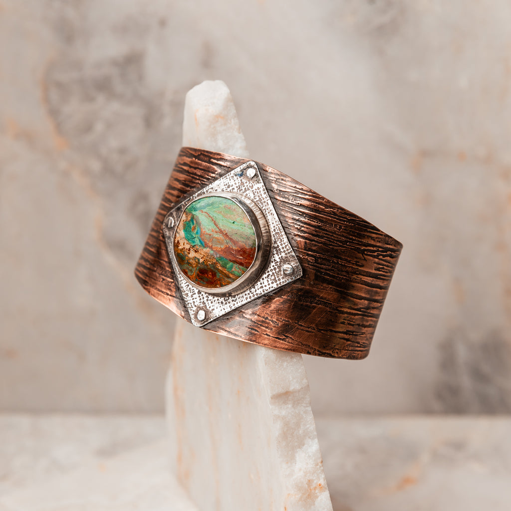 Mixed metals, mesmerizing opal hues – a closer look at our Rustic Cuff. #HandcraftedElegance #BlueOpalMagic
