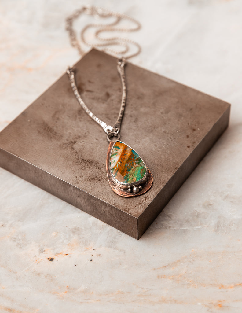 Elevate your neckline with our Peruvian Blue Opal Pendant Necklace – a rustic masterpiece of handcrafted elegance. #OpalNecklace #ArtisanCharm