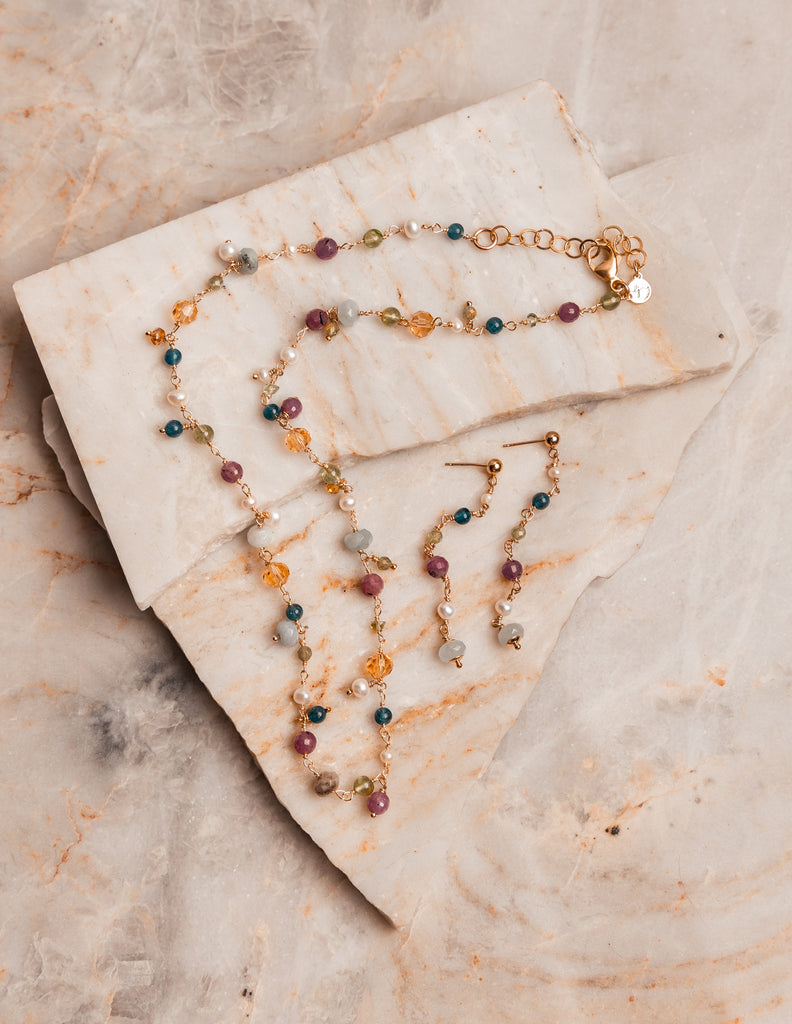 Happiness-inspired jewelry – Felicity Necklace with ruby, peridot, aquamarine, pearl, and sodalite.