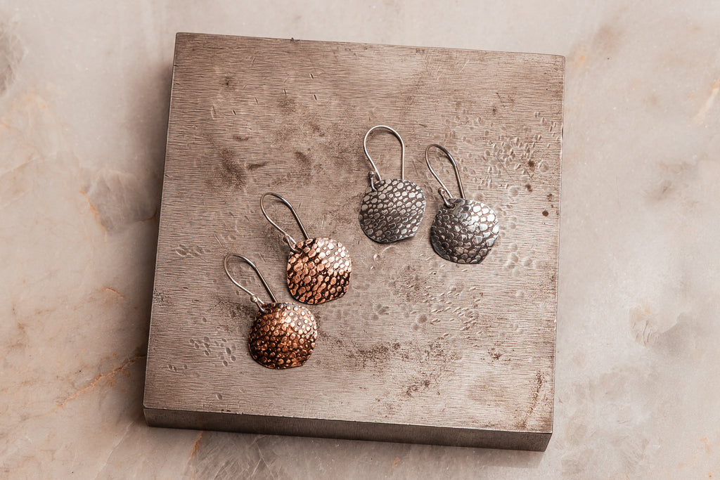 Rustic earrings for women with boho flair, handcrafted in sterling silver and copper for earthy elegance.