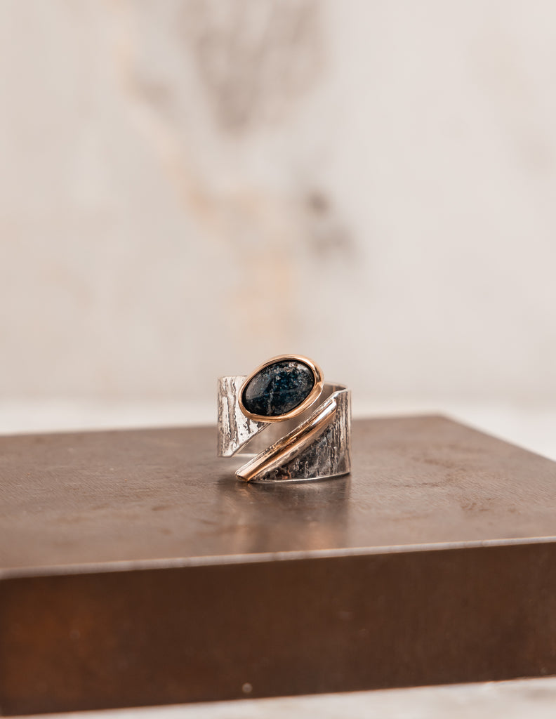 Luxury mixed metal ring featuring hand-formed silver and 14k gold, perfect for collectors of one-of-a-kind artisan jewelry