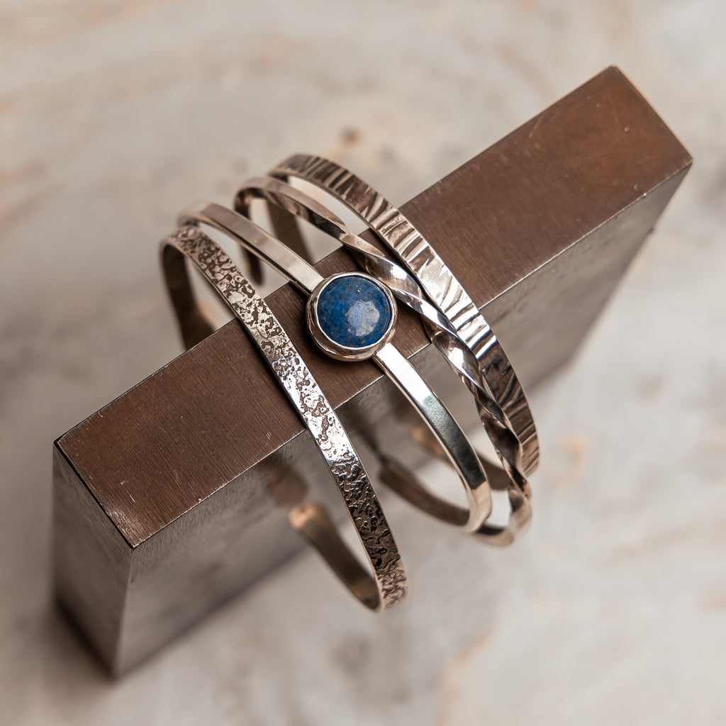 Versatile silver cuff bracelet featuring beautiful lapis lazuli gemstone