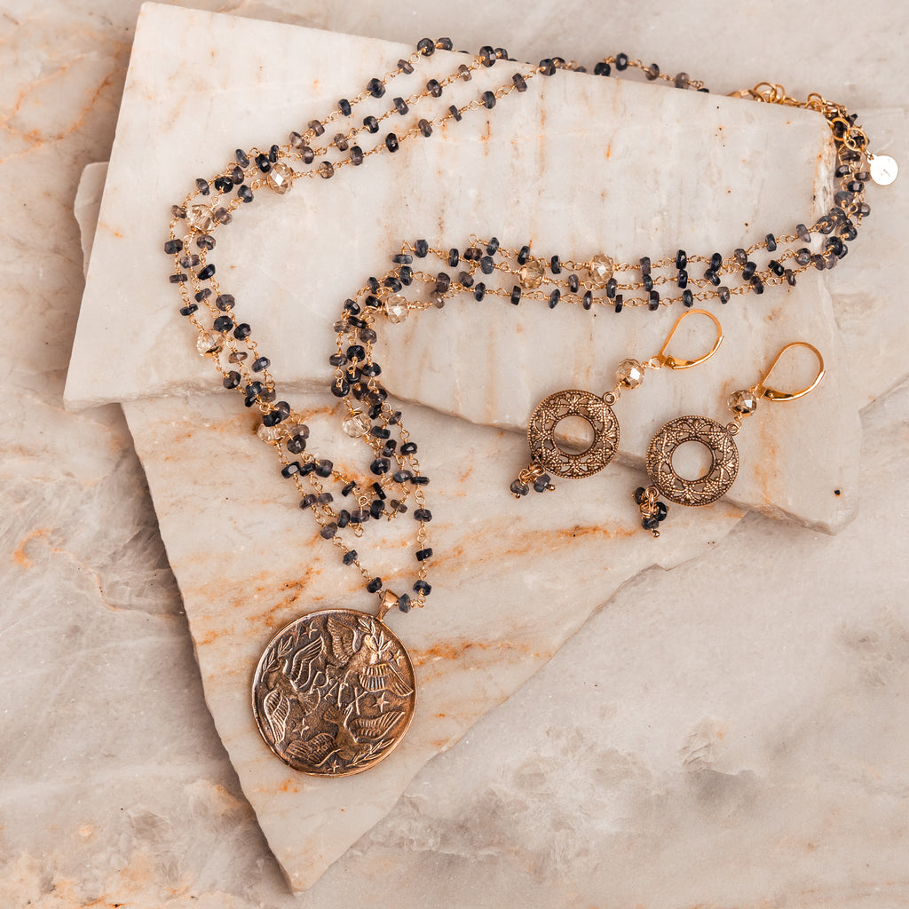 Unique vintage-inspired earrings – brass medallions with champagne and iolite accents.