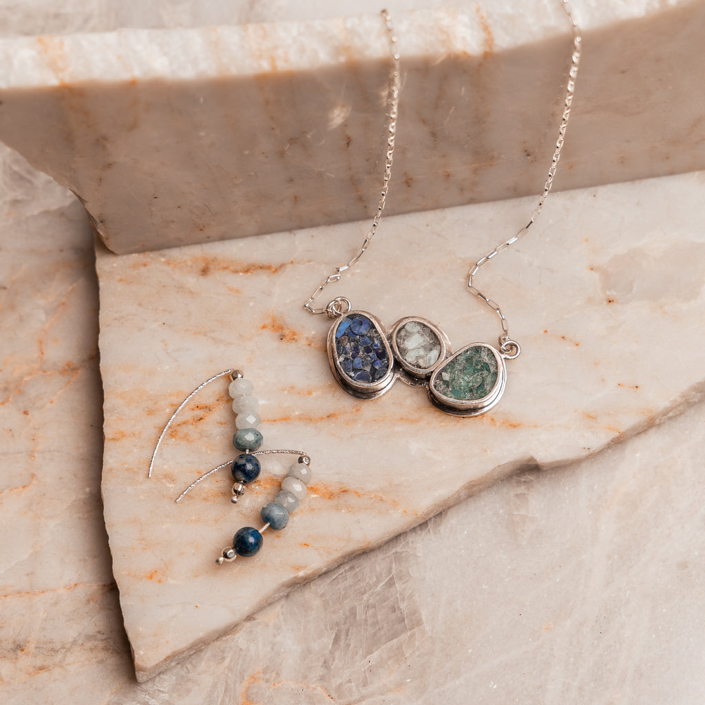 Unique handcrafted necklace with deep blue and soft green tones, perfect for women with expressive, intentional style