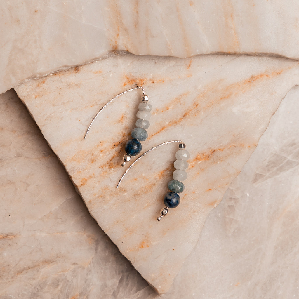 Artisan earrings featuring aquamarine and lapis lazuli gemstones