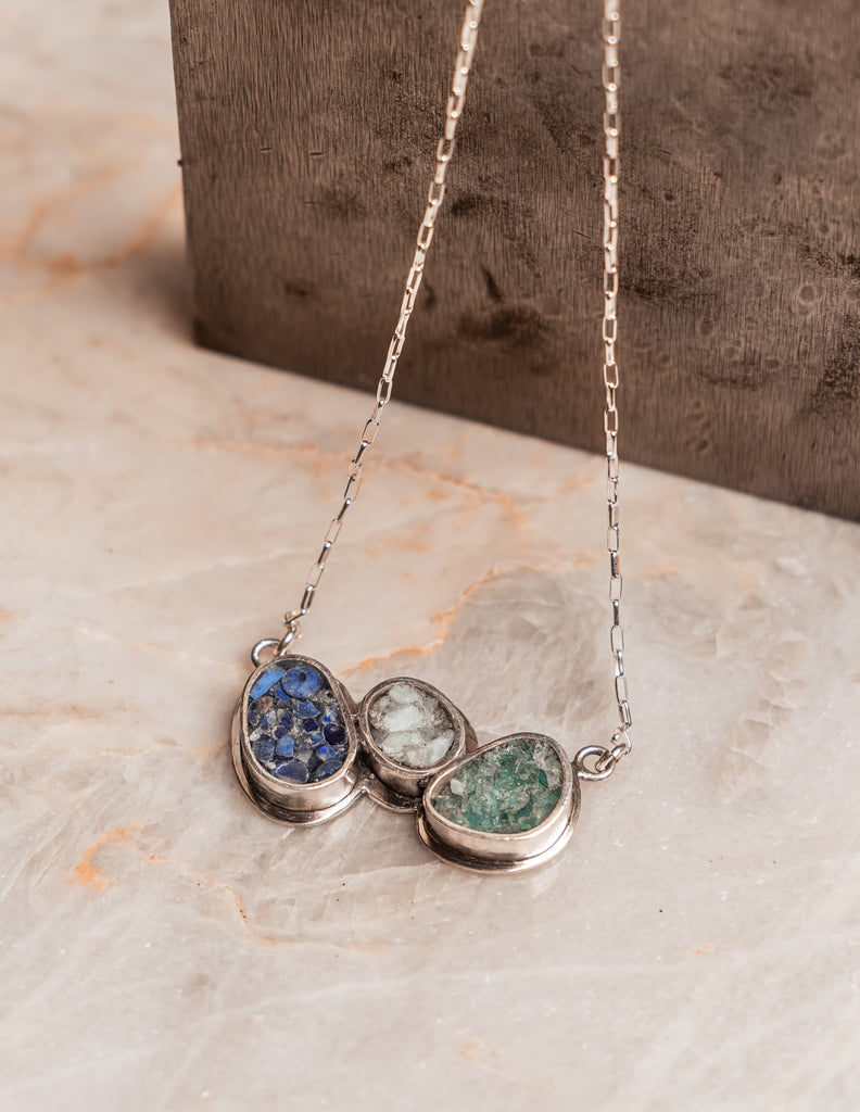 Modern artisan necklace with mixed blue-green stones, ideal for layering or wearing solo
