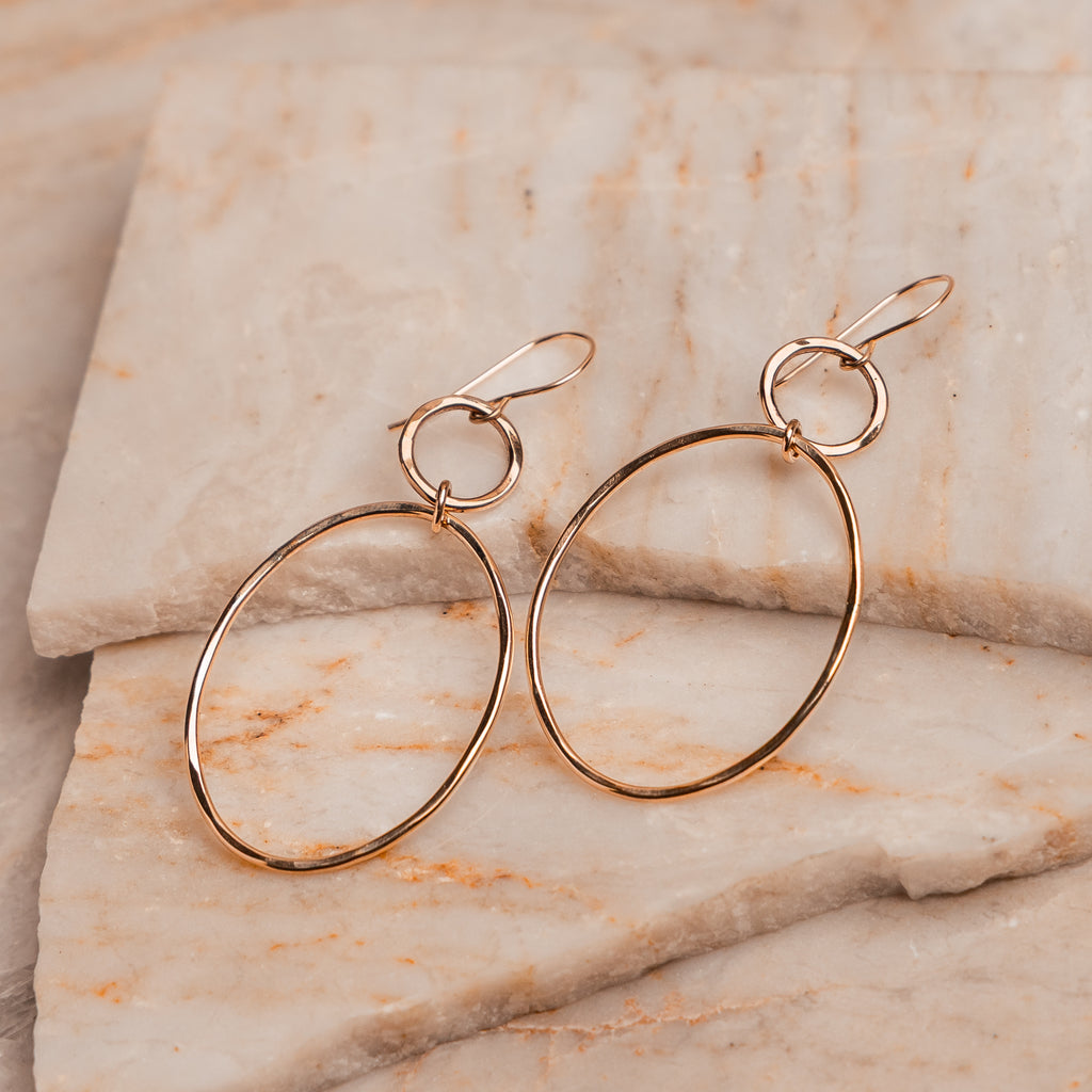 Elegant handcrafted double hoop earrings with hand-hammered texture, lightweight and versatile for day-to-night wear