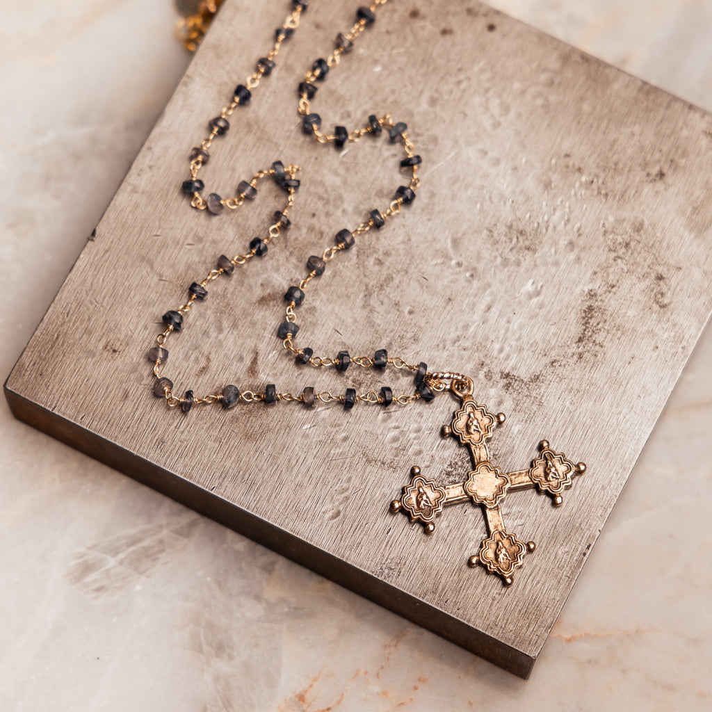 "Timeless Ruth Necklace with a solid bronze Gothic cross, ideal for expressing faith and style."
