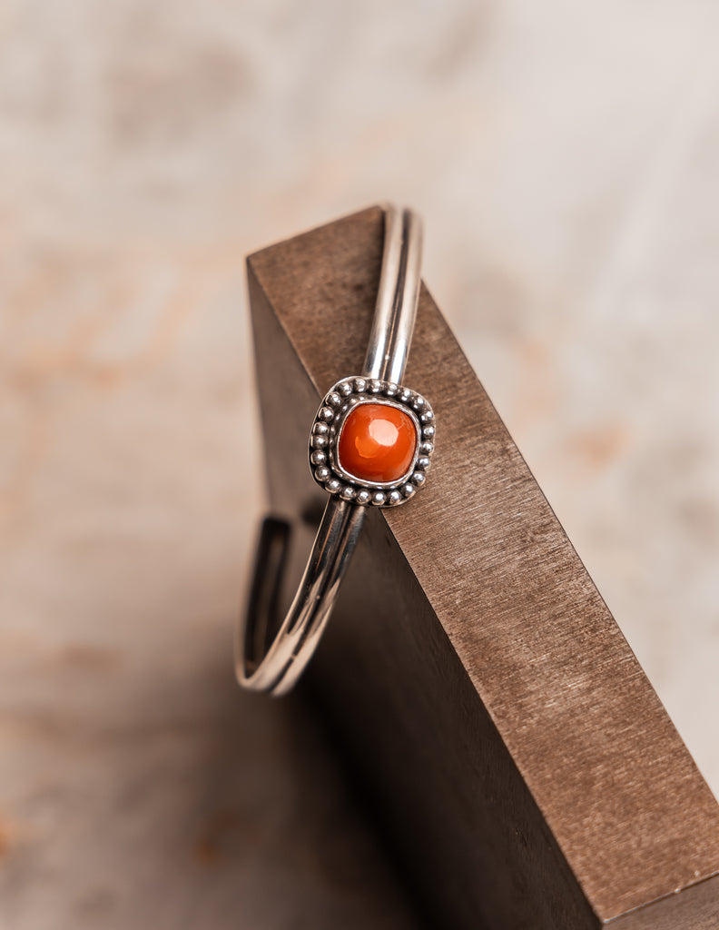 Unique gemstone cuff bracelet with hand-set opal and beaded detail