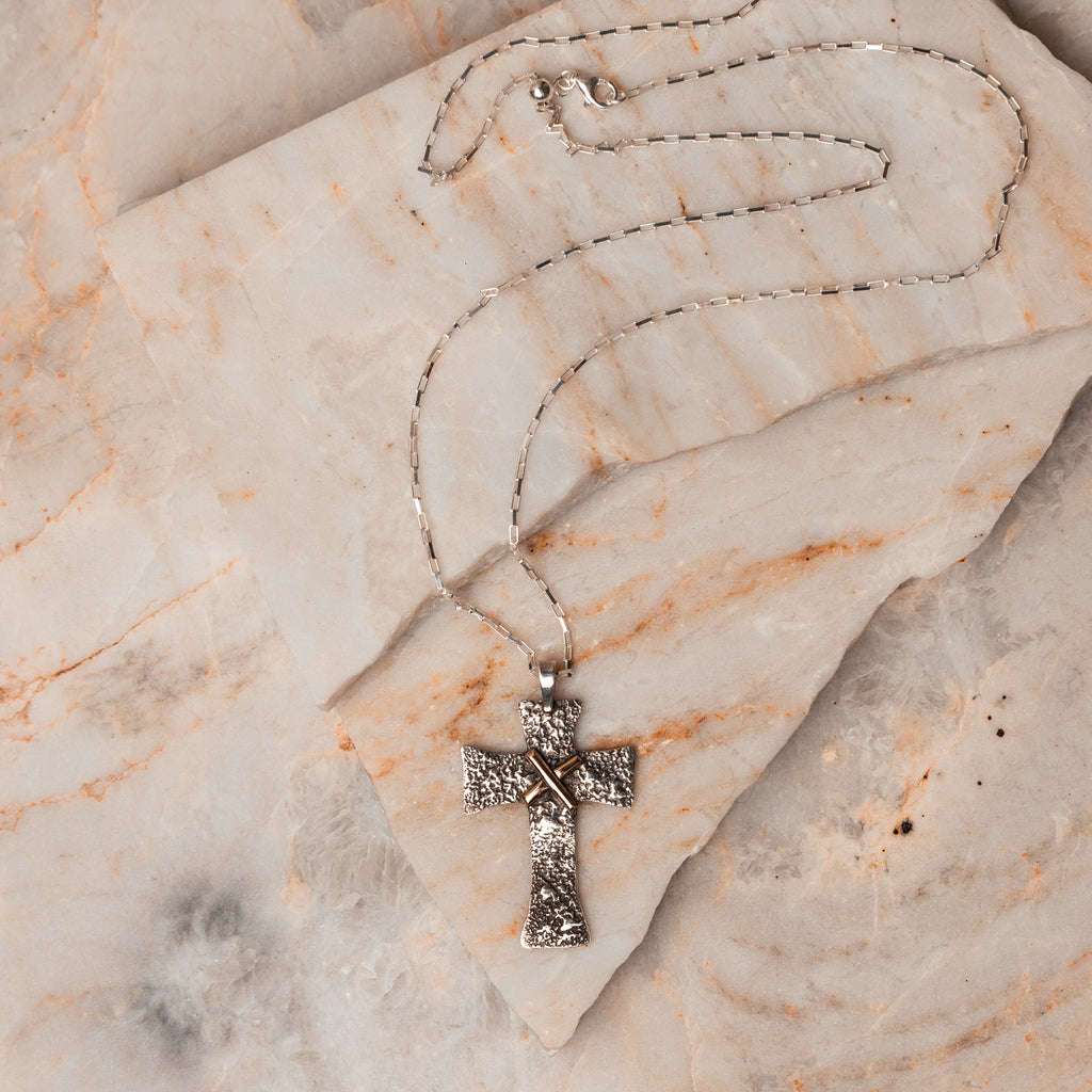 Heirloom-Quality Craftsmanship - Salome Cross Necklace with distinctive texture and solid gold detail. Adjustable length and sterling silver lobster clasp. A meaningful gift