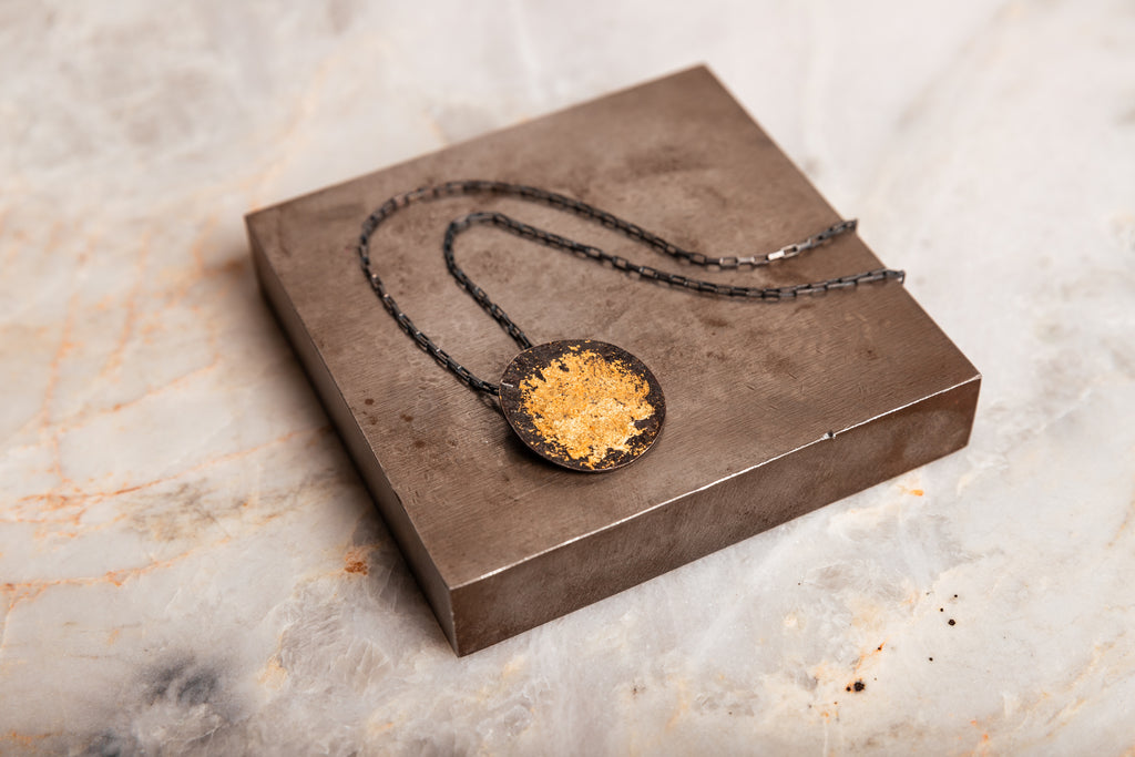 black and gold necklace