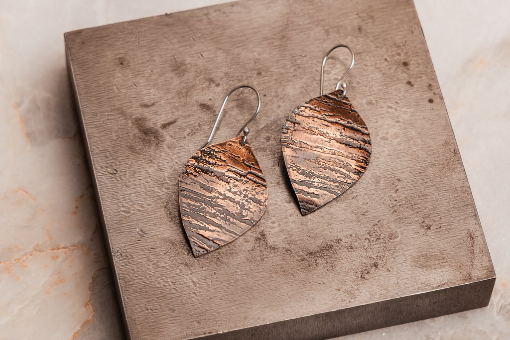 Handmade rustic copper earrings, perfect for casual wear or gifting to a boho style enthusiast