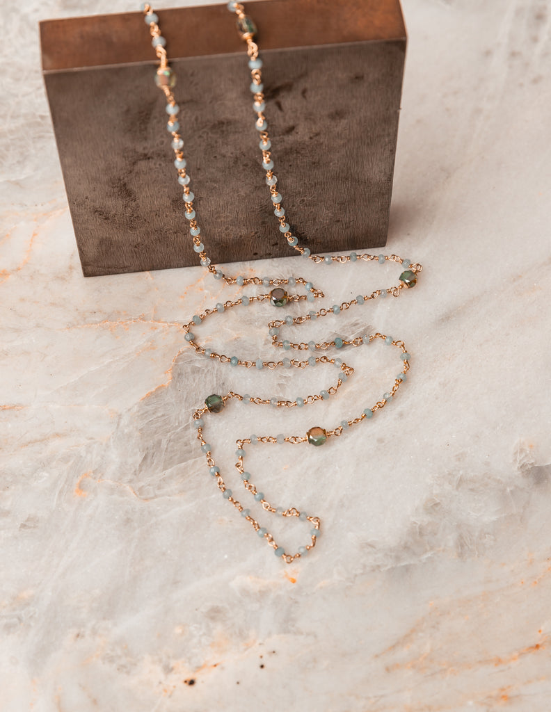 Feminine Elegance - Cosette Beaded Necklace showcasing aquamarine gemstones, sage green accents, and gold-filled details. Handcrafted and adjustable for a versatile and romantic look