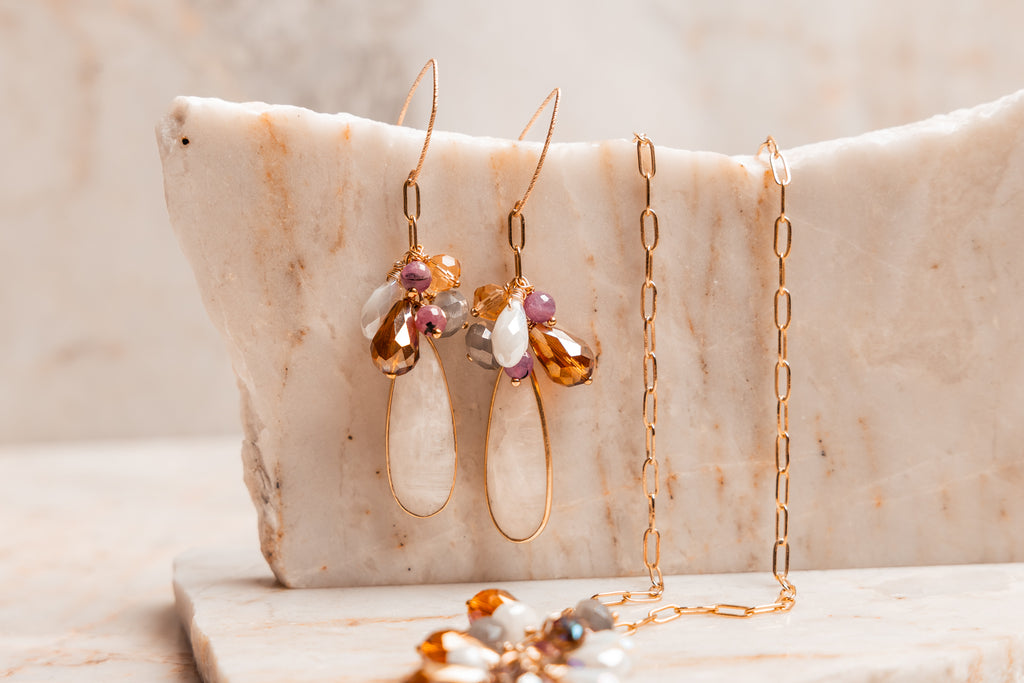Unique artisan jewelry – handcrafted earrings with moonstone teardrops and rubies.