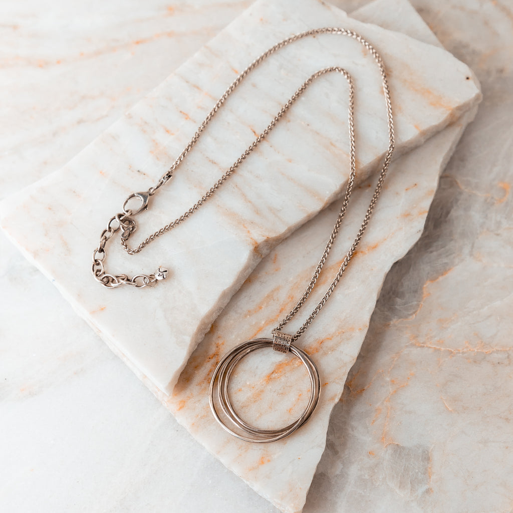 silver hammered circle necklace