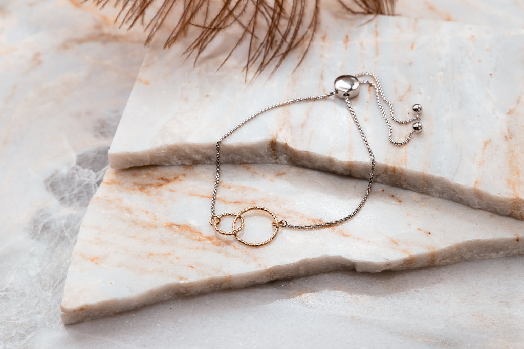 silver and gold circle bracelet