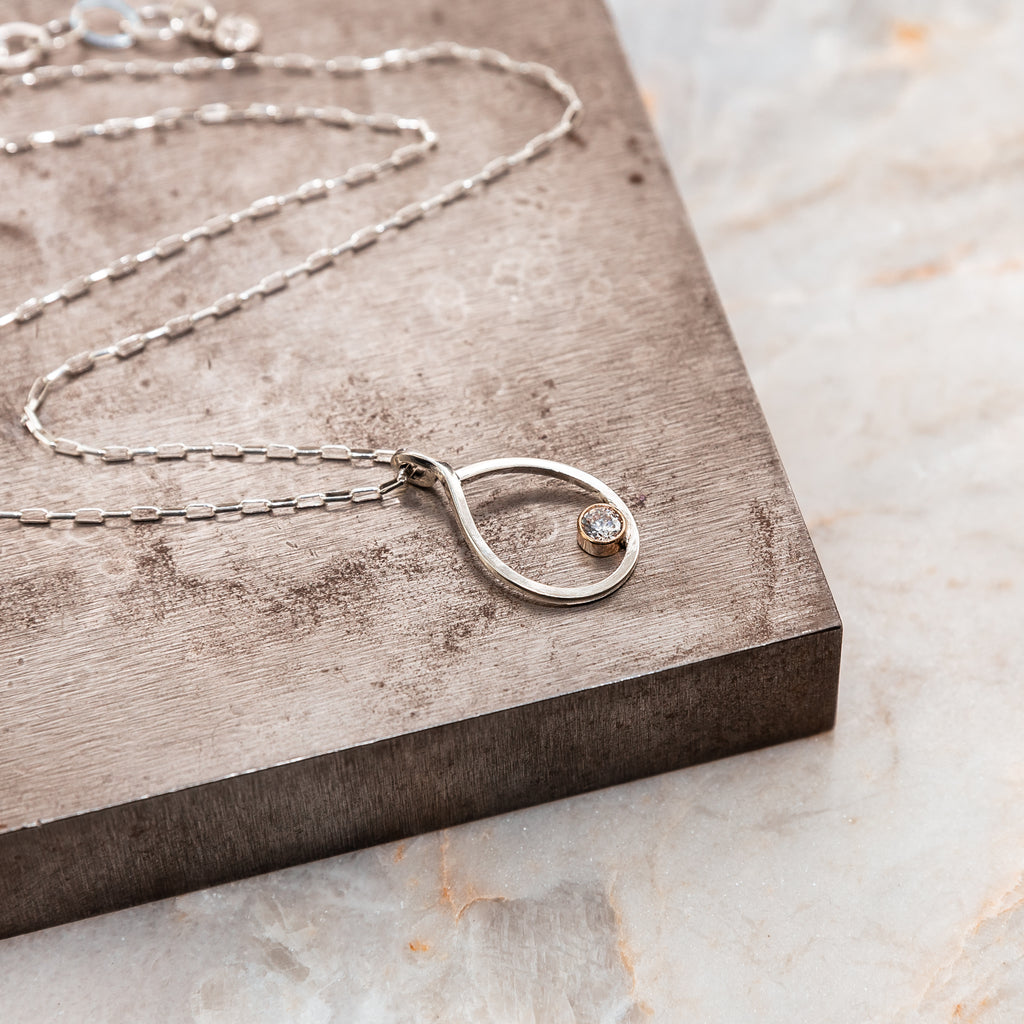 silver and gold necklace